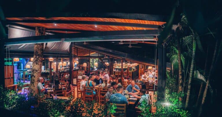 dragonfly bar grill open air dining room at night 768x406