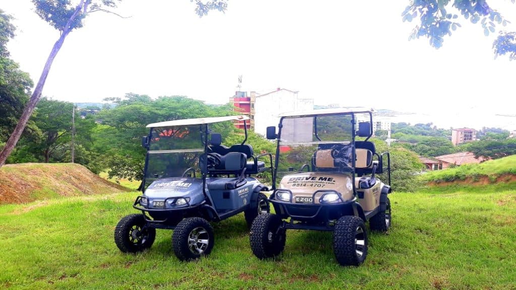Gated golf cart tour vehicles at Tamarindo golf course in Costa Rica.