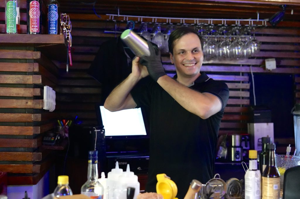 bartender shaking cocktail