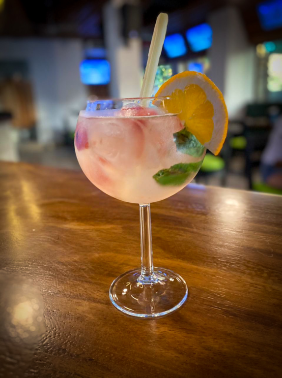 pink cocktail citrus garnish
