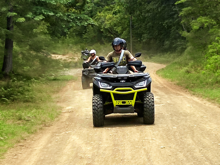 atv rider front view dirt road