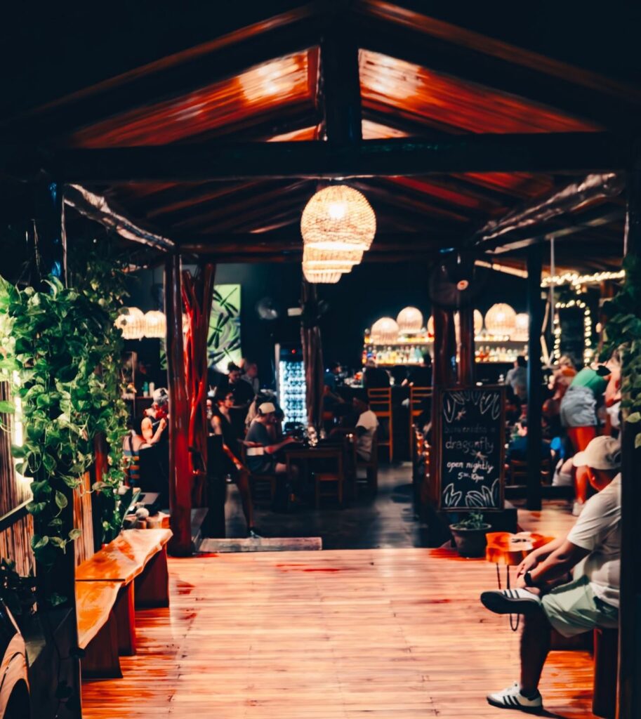 dragonfly bar grill entrance walkway at night 1 913x1024