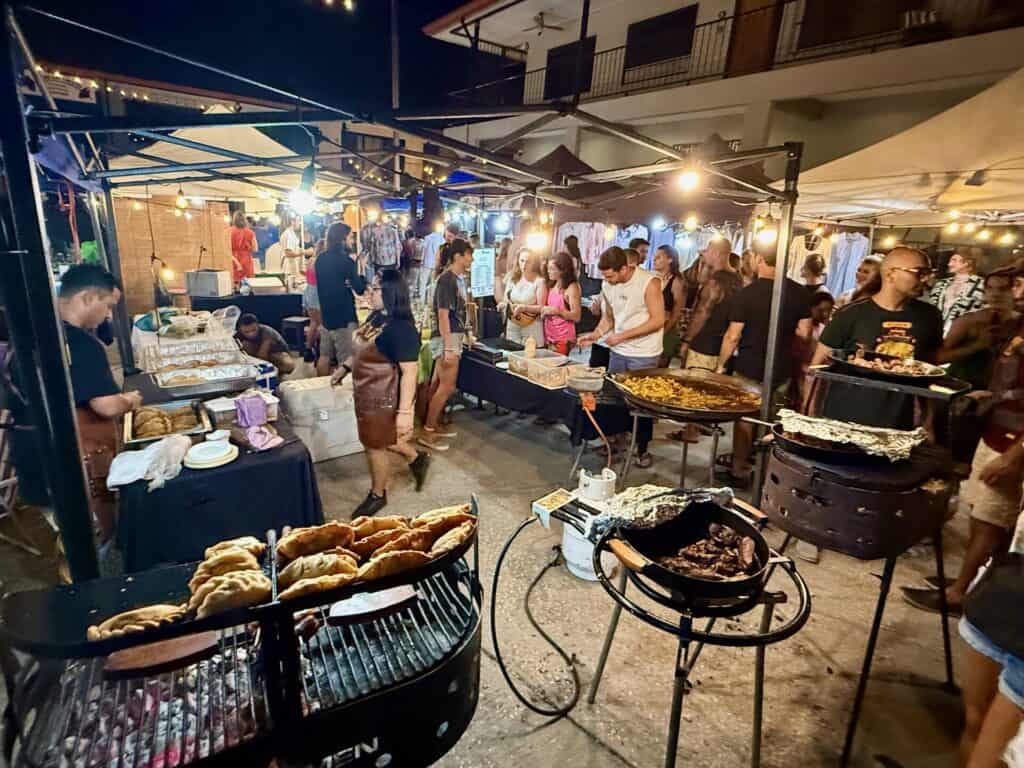 Grill stalls with empanadas and food at the Tamarindo night market